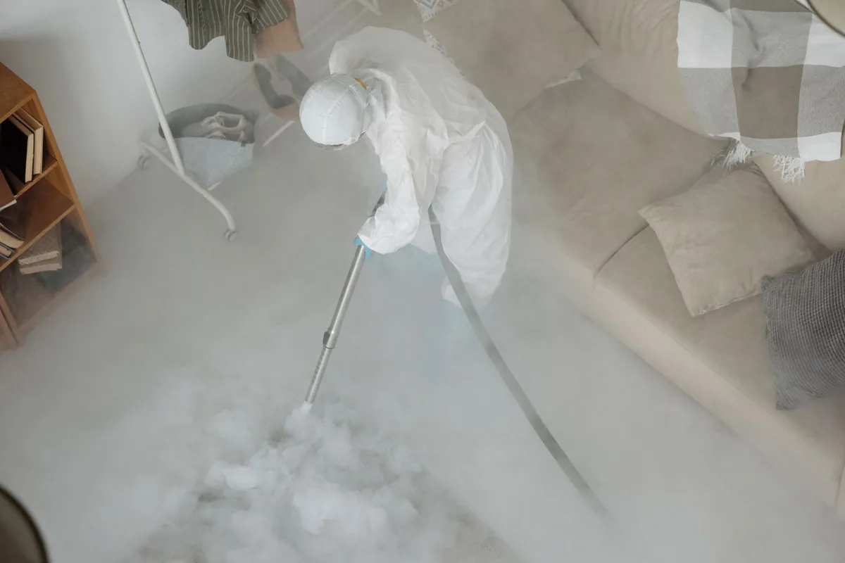 Biohazard cleanup technician in protective equipment, Murray, UT